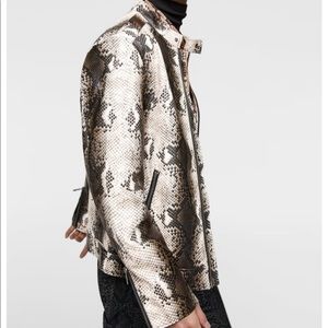 Snake print jacket and matching pants.